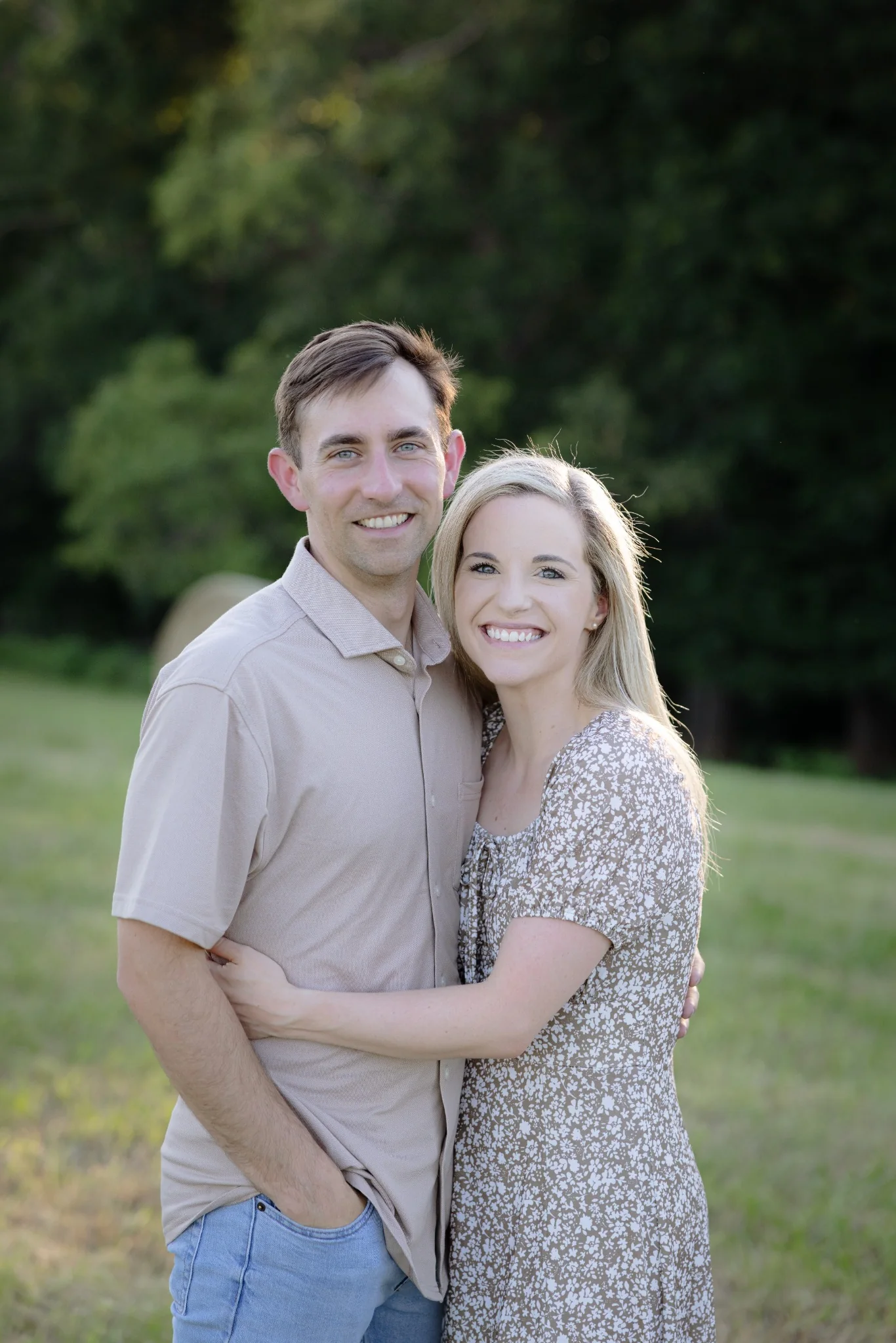 Chris Herring and Dr. Hannah Thompson smiling together outdoors